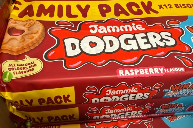 Family packs of Jammie Dodgers for sale on a shelf in Home Bargains