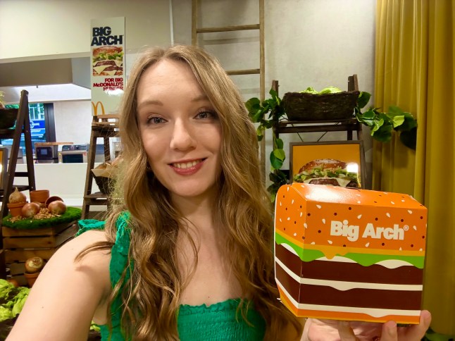 Courtney Pochin holding a Big Arch box at McDonald's HQ