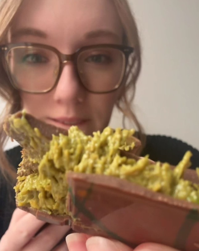 Courtney Pochin trying the OG Dubai chocolate bar by Fix Chocolate. Image shows Courtney holding up a chunk of the bar.