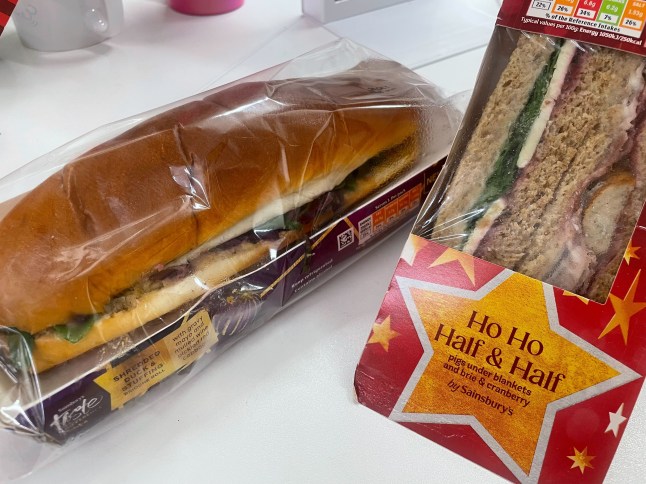 Sainsbury's Ho Ho and a Half and Duck Roll in packets on a table